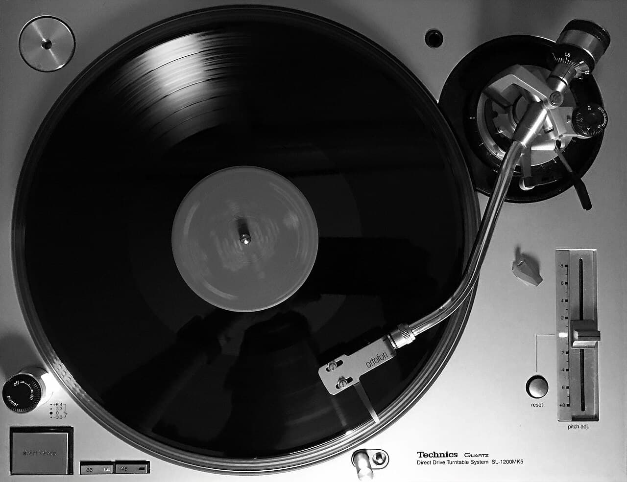 A Technics SL-1200 turntable — the DJ workhorse behind decades of house and tech house sets