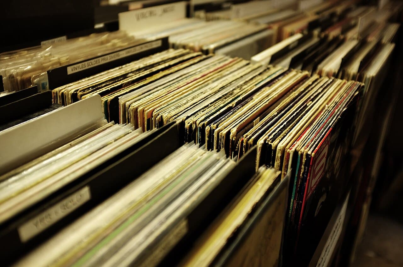 Crates of vinyl records at a store — the house labels worth digging for