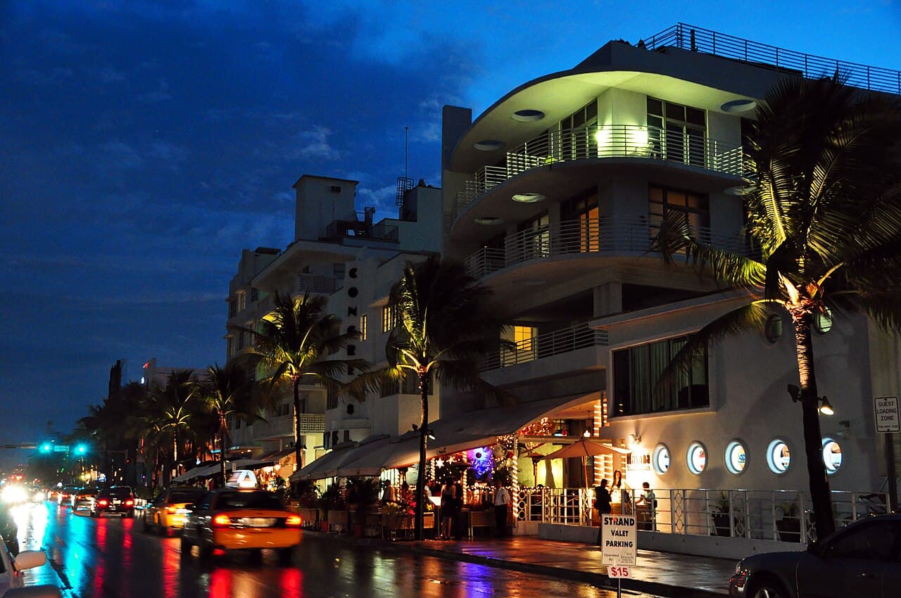 Ocean Drive, South Beach, at night — the Miami Beach neighbourhood near Do Not Sit On The Furniture (not a photo of the venue's interior)