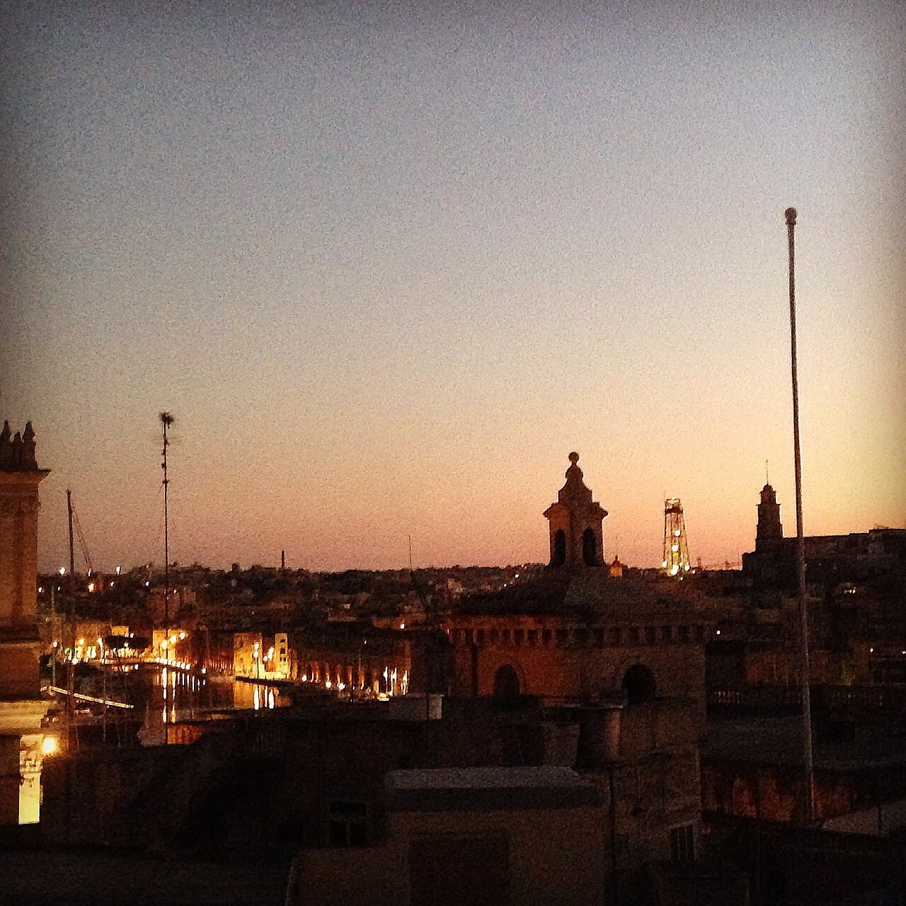 Valletta, Malta at dusk — the Mediterranean island that hosts Glitch Festival each August