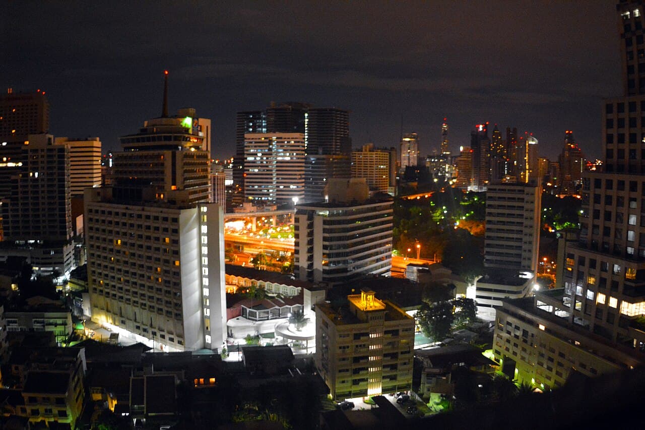 Silom at night, Bangkok — one of the city's nightlife districts and home to Mustache Bangkok's current venue