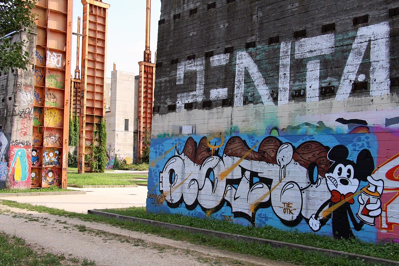 Parco Dora in Turin, a post-industrial park under a steel factory canopy — the open-air home of Kappa FuturFestival